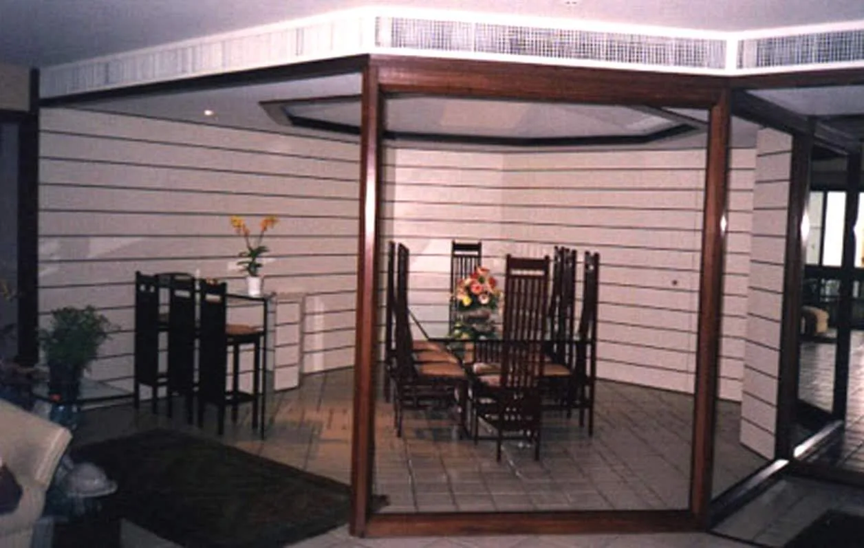 Sala de jantar em projeto residencial de arquitetura e interiores